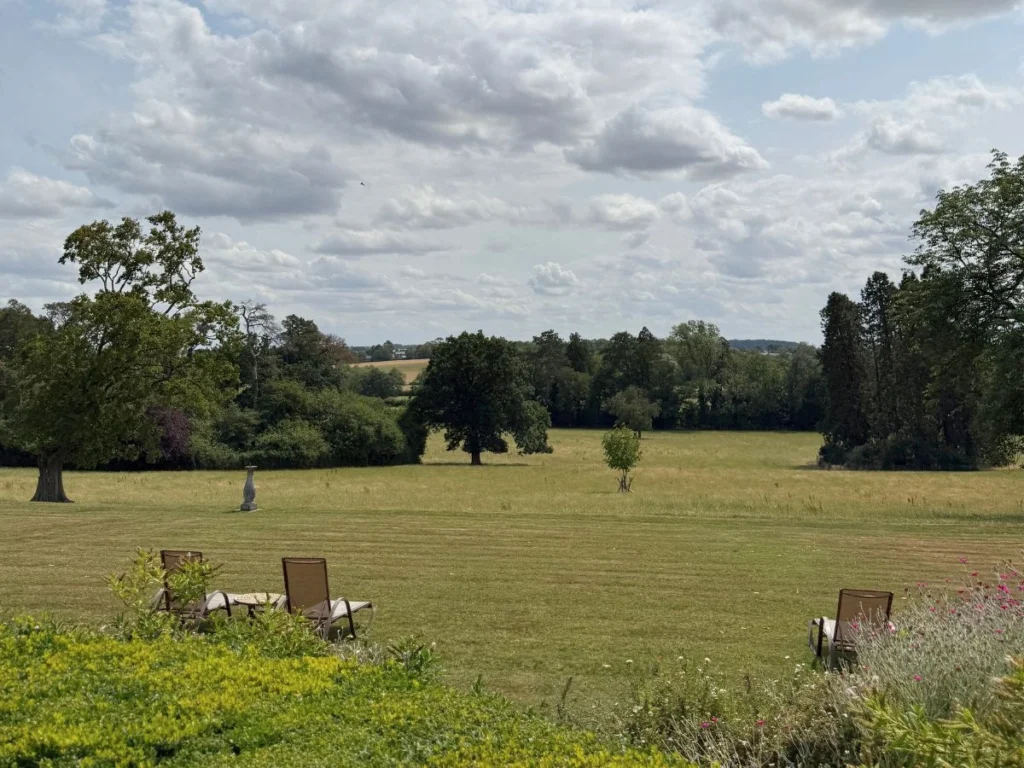 The grounds of Kilwoth House Hotel with sun loungers on the lawn.